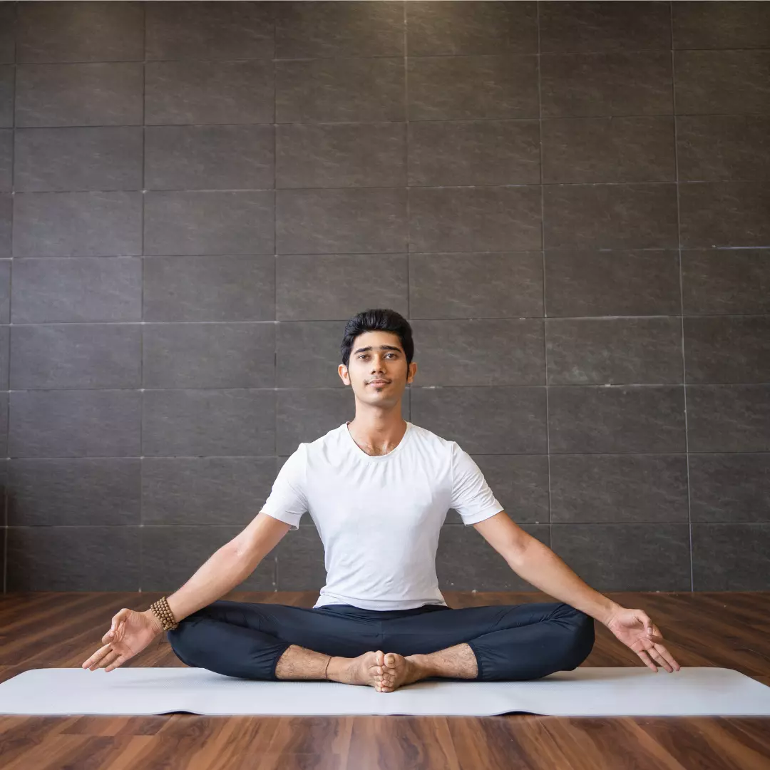Rishikesh Yog Kendra Student following a live online yoga teacher training class from home