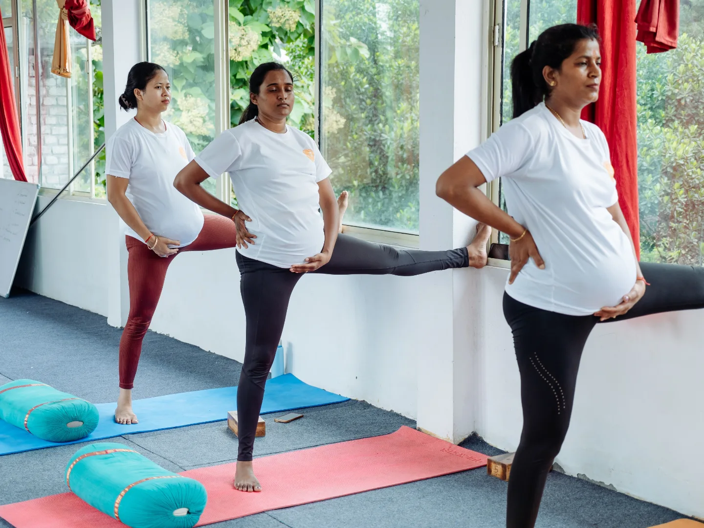 Expecting mothers practising a wall-supported standing balance during the seven-day prenatal and postnatal training