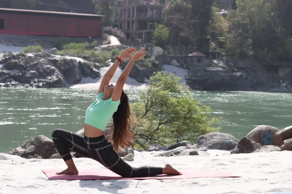 Low lunge with the chest opening, practised beside the river